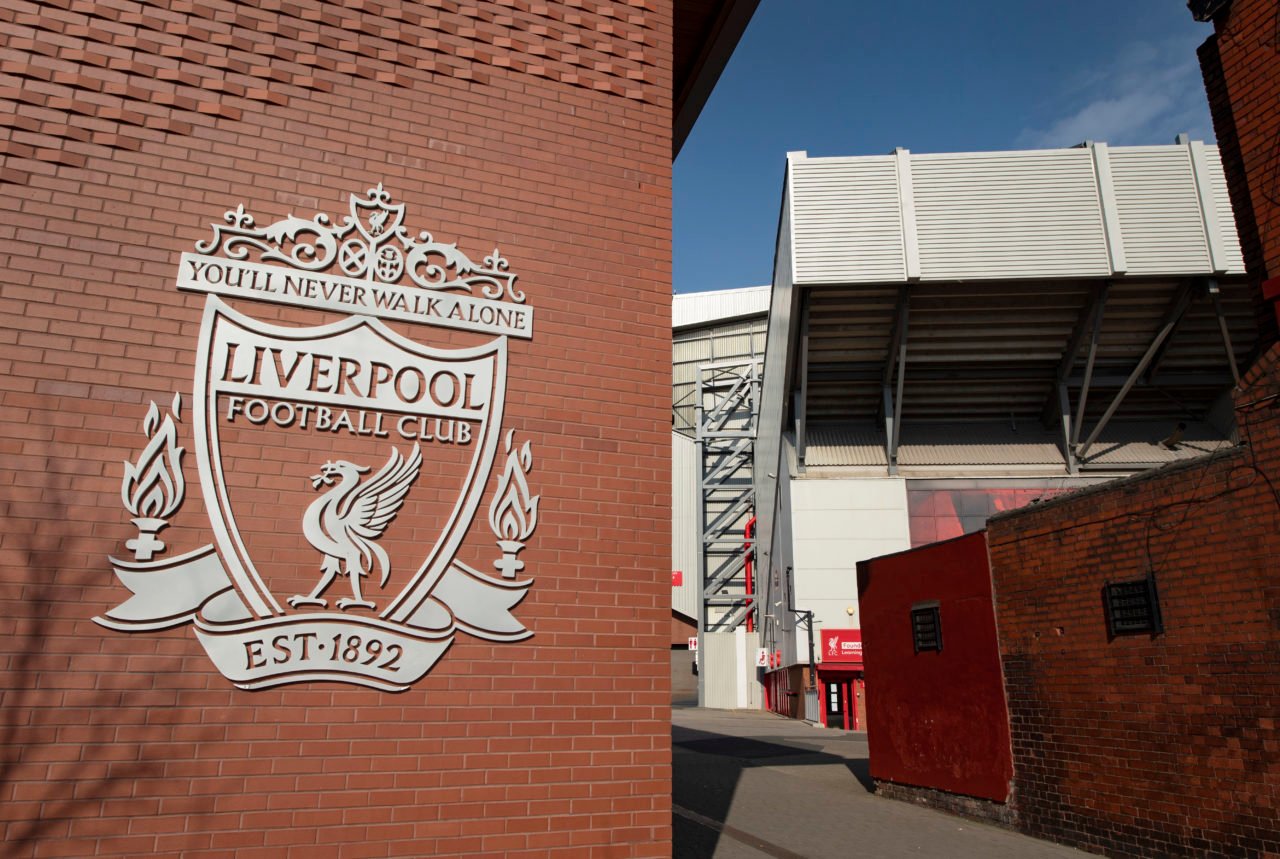 The Liverpool FC club crest on a wall outside the Anfield Stadium, home of Liverpool FC on March 24, 2022 in Liverpool, England.
