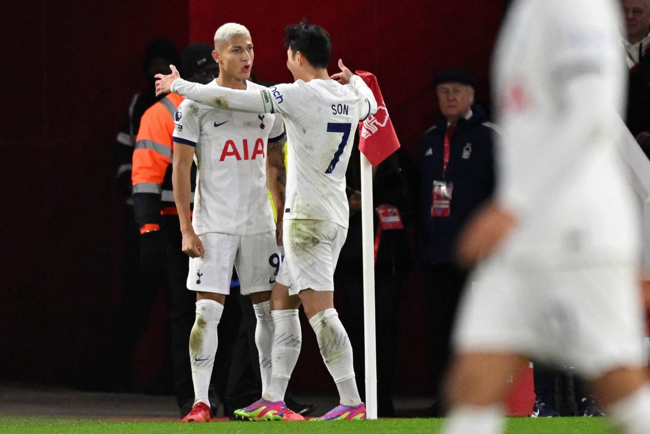 Tottenham Hotspur's Brazilian striker #09 Richarlison (L) celebrates with Tottenham Hotspur's South Korean striker #07 Son Heung-Min (R) after scor...