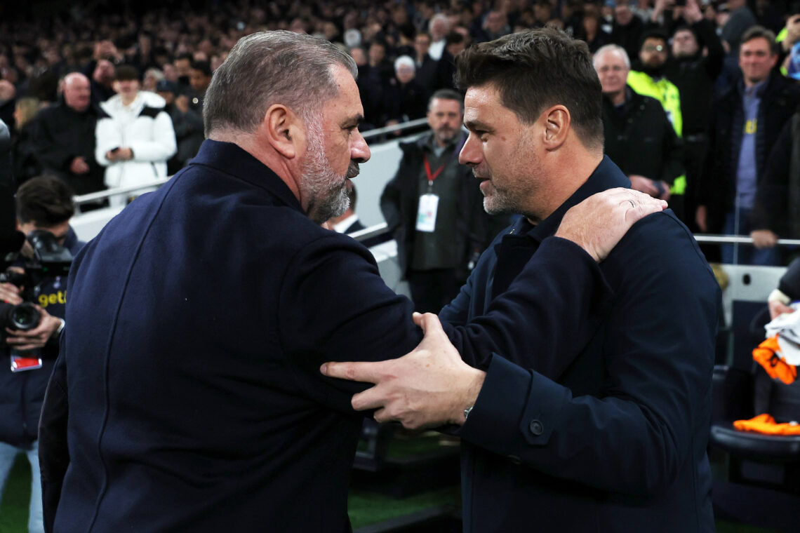 Ange Postecoglou, Manager of Tottenham Hotspur, (L) and Mauricio Pochettino, Manager of Chelsea, interact prior to the Premier League match between...