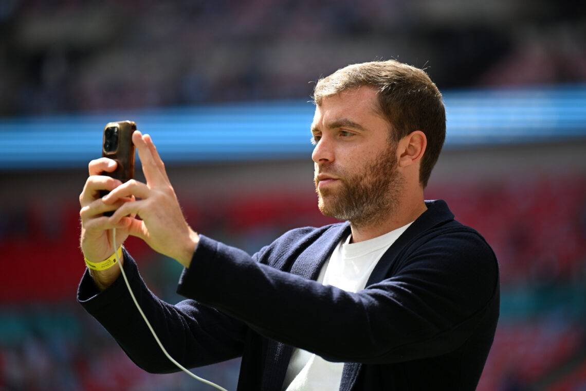 Italian Sports Journalist, Fabrizio Romano, looks on with his phone prior to the Emirates FA Cup Final match between Manchester City and Manchester...