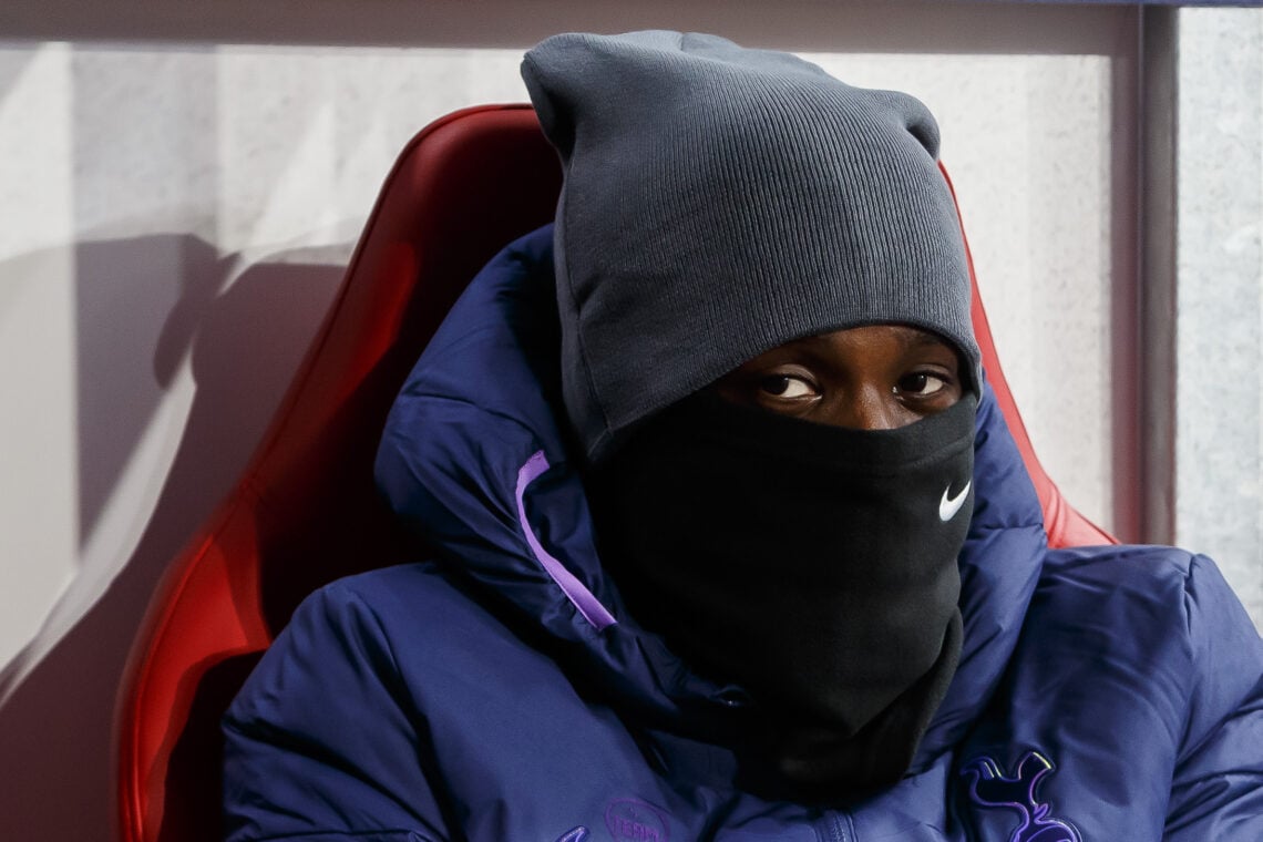 (BILD ZEITUNG OUT) Tanguy Ndombele of Tottenham Hotspur sits on the bench prior to the UEFA Champions League round of 16 second leg match between R...