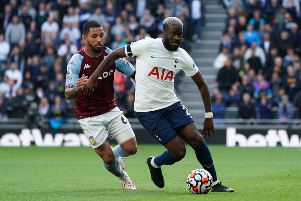 Tottenham Hotspur's Tanguy NDombele shields the ball from Aston Villa's Douglas Luiz during the Premier League match between Tottenham Hotspur and ...