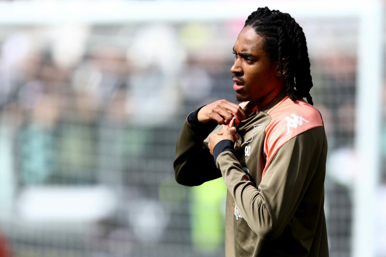Djed Spence of Genoa Cfc warm up prior to the Serie A TIM match between Juventus and Genoa CFC at Allianz Stadium on March 17, 2024 in Turin, Italy.