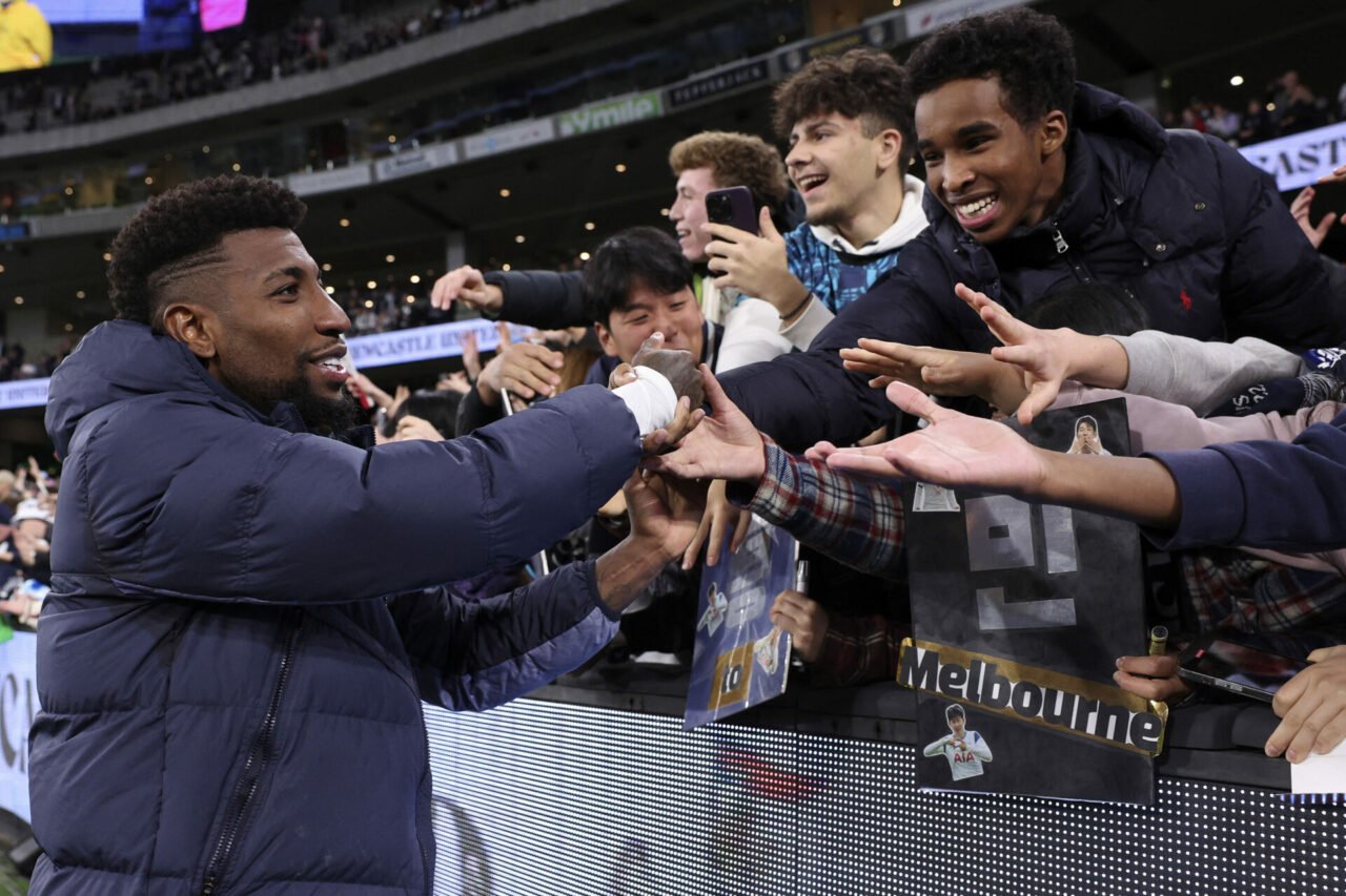 Tottenham Hotspur's Emerson Royal high fives supporters after the final whistle of the friendly football match between Newcastle United and Tottenh...