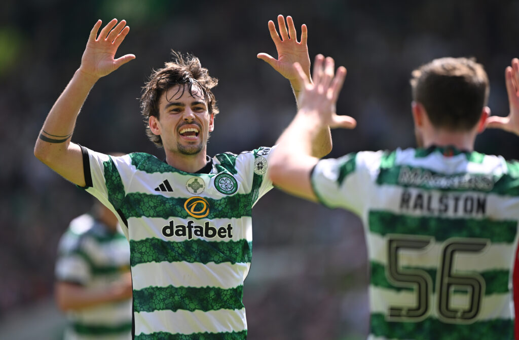 Matt O' Riley (l) of Celtic celebrates the winning Celtic goal with team mate Anthony Ralston during the Cinch Scottish Premiership match between C...