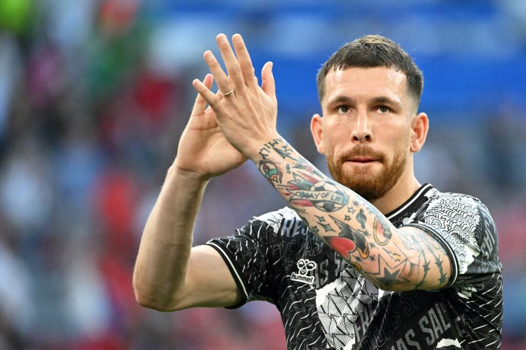 Denmark's midfielder #23 Pierre-Emile Hojbjerg applauds prior to the  UEFA Euro 2024 Group C football match between Denmark and Serbia at the Munic...