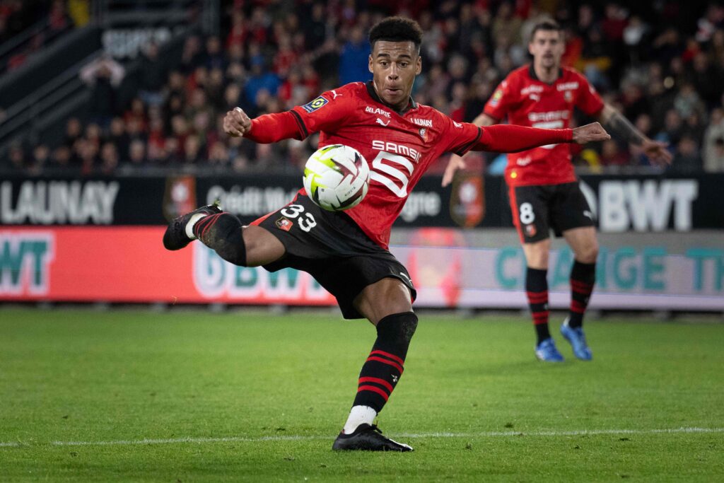 Rennes' French midfielder #33 Desire Doue kicks the ball during the French L1 football match between Stade Rennais FC and RC Strasbourg at The Roaz...