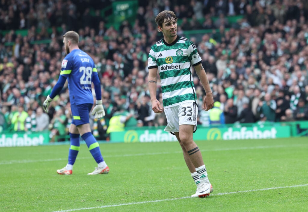 Matt O'Riley of Celtic reacts after scoring his team's third goal during the Cinch Scottish Premiership match between Celtic FC and Heart of Midlot...