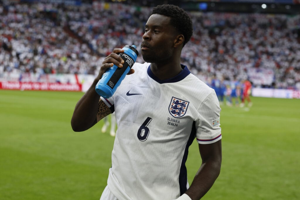 Marc Guehi of England takes a drink during the UEFA EURO 2024 round of 16 match between England and Slovakia at Arena AufSchalke on June 30, 2024 i...