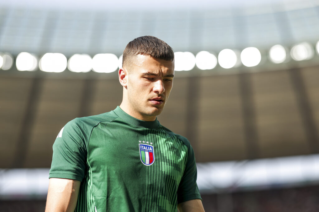 Alessandro Buongiorno of Italy looks on after warm up prior to the UEFA EURO 2024 round of 16 match between Switzerland and Italy Group B at Olympi...