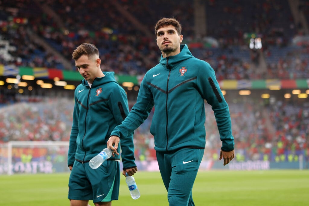 Pedro Neto of Portugal looks on as he inspects the pitch prior to the UEFA EURO 2024 quarter-final match between Portugal and France at Volksparkst...