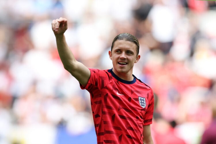 Conor Gallagher of England acknowledges the fans as he warms up prior to the UEFA EURO 2024 quarter-final match between England and Switzerland at ...