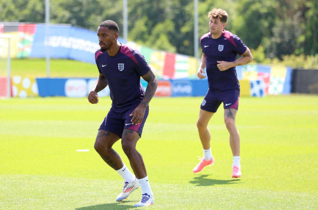 Ivan Toney and John Stones of England warm up during a training session at Spa & Golf Resort Weimarer Land on July 09, 2024 in Blankenhain, Ger...