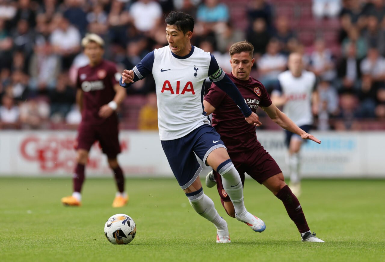 Heung-Min Son of Tottenham Hotspur vies with Cameron Devlin of Hearts duringt he Pre-Season Friendly between Heart of Midlothian and Tottenham Hots...