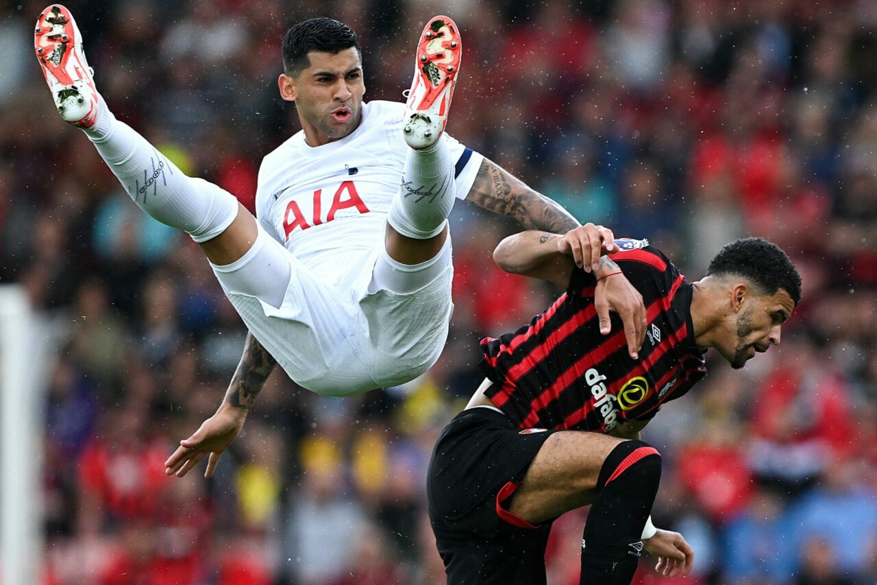TOPSHOT - Tottenham Hotspur's Argentinian defender #17 Cristian Romero (L) challenges Bournemouth's English striker #09 Dominic Solanke during the ...