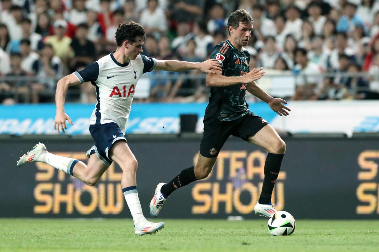 Thomas Muller of Bayern Muenchen (R) goes past Archie Gray of Tottenham Hotspur (L) during the pre-season friendly between Tottenham Hotspur and Ba...