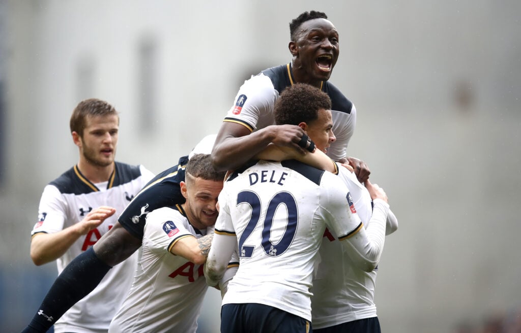 Christian Eriksen of Tottenham Hotspur (R/obscure) celebrates scoring his sides first goal and his mobbed by Victor Wanyama of Tottenham Hotspur (C...